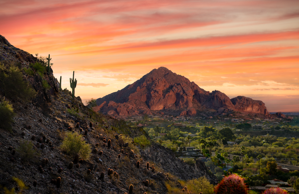 Scenic view of a mountain range with dusk in the background.