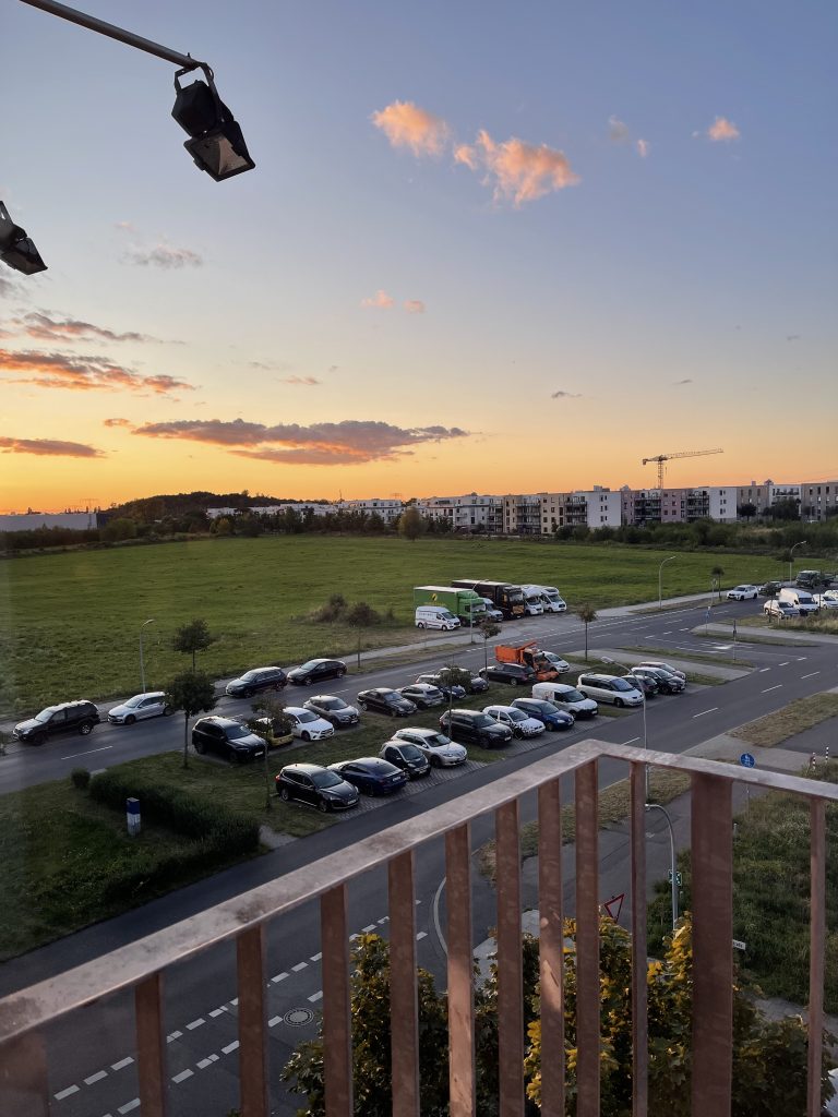 Sunset near a parking lot