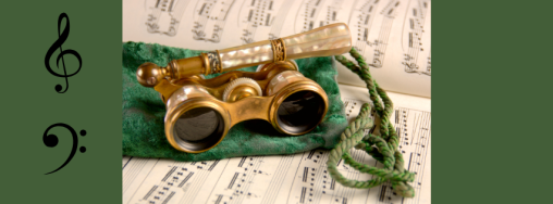 Old style gold opera glasses on top of a green velvet pouch and sheet music