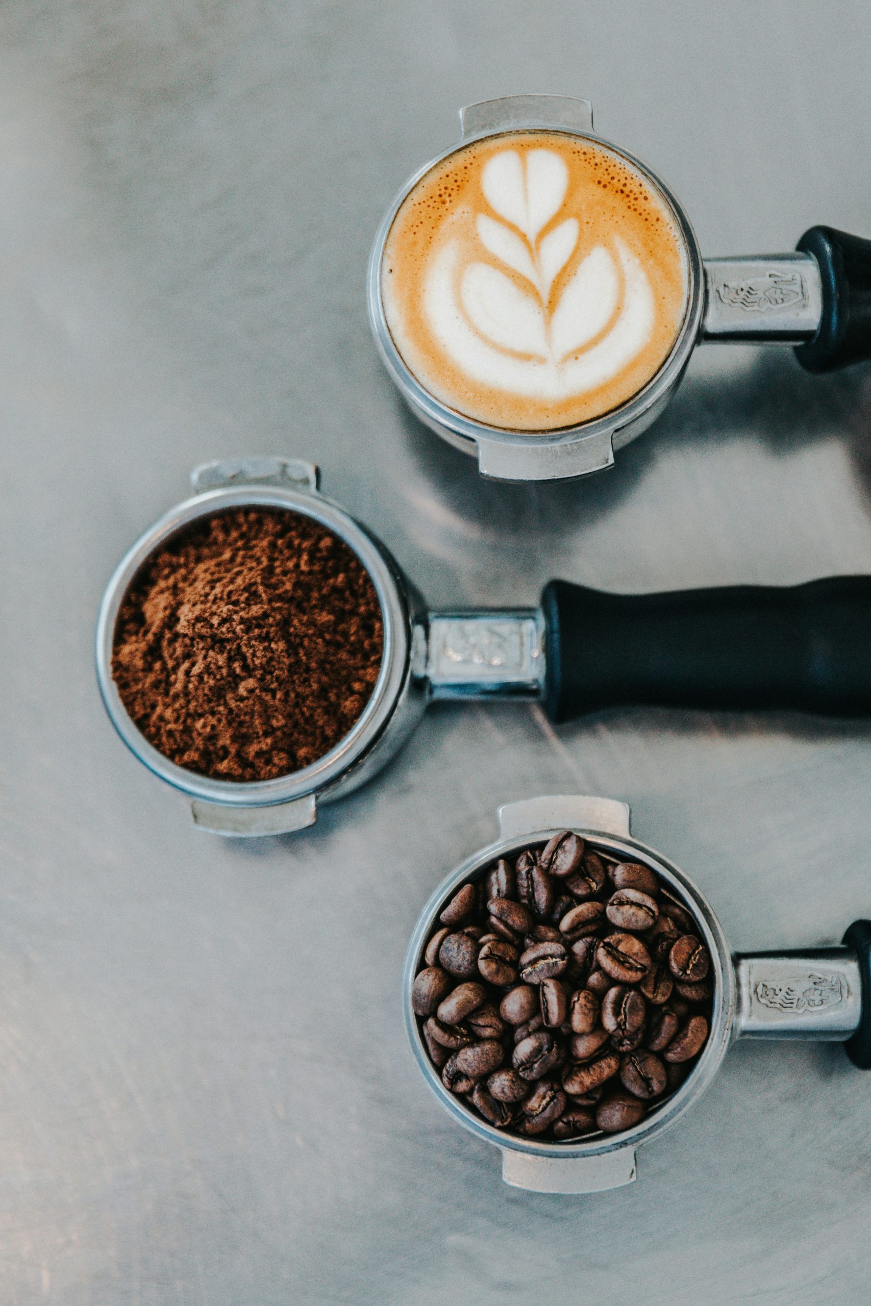 Portafilter, Coffee, and coffee beans.