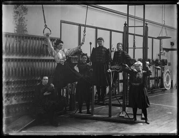Group of women playing around with gymnasium equipment